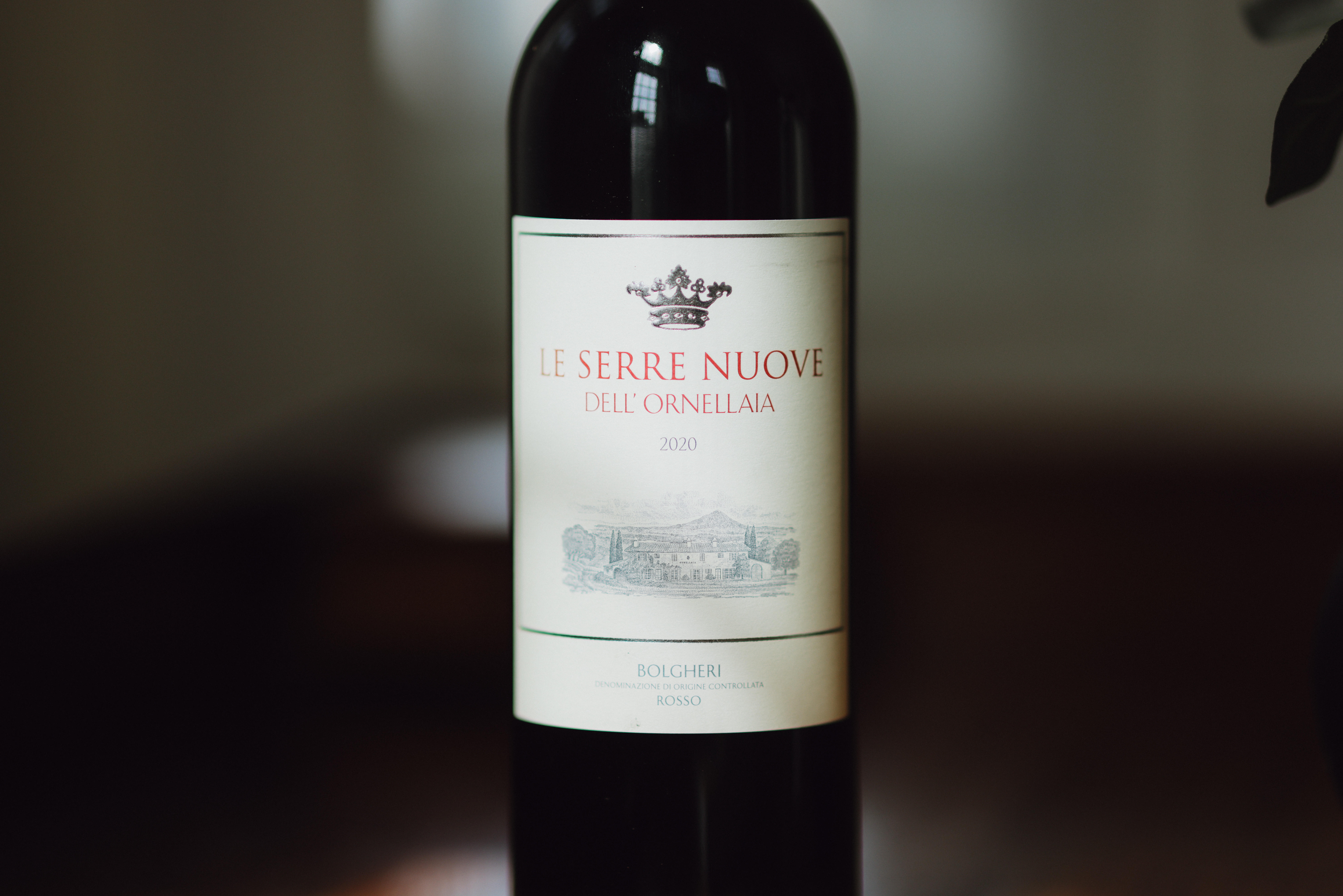 A close up of Le Serre Nuove dell'Ornellaia on a dark background.