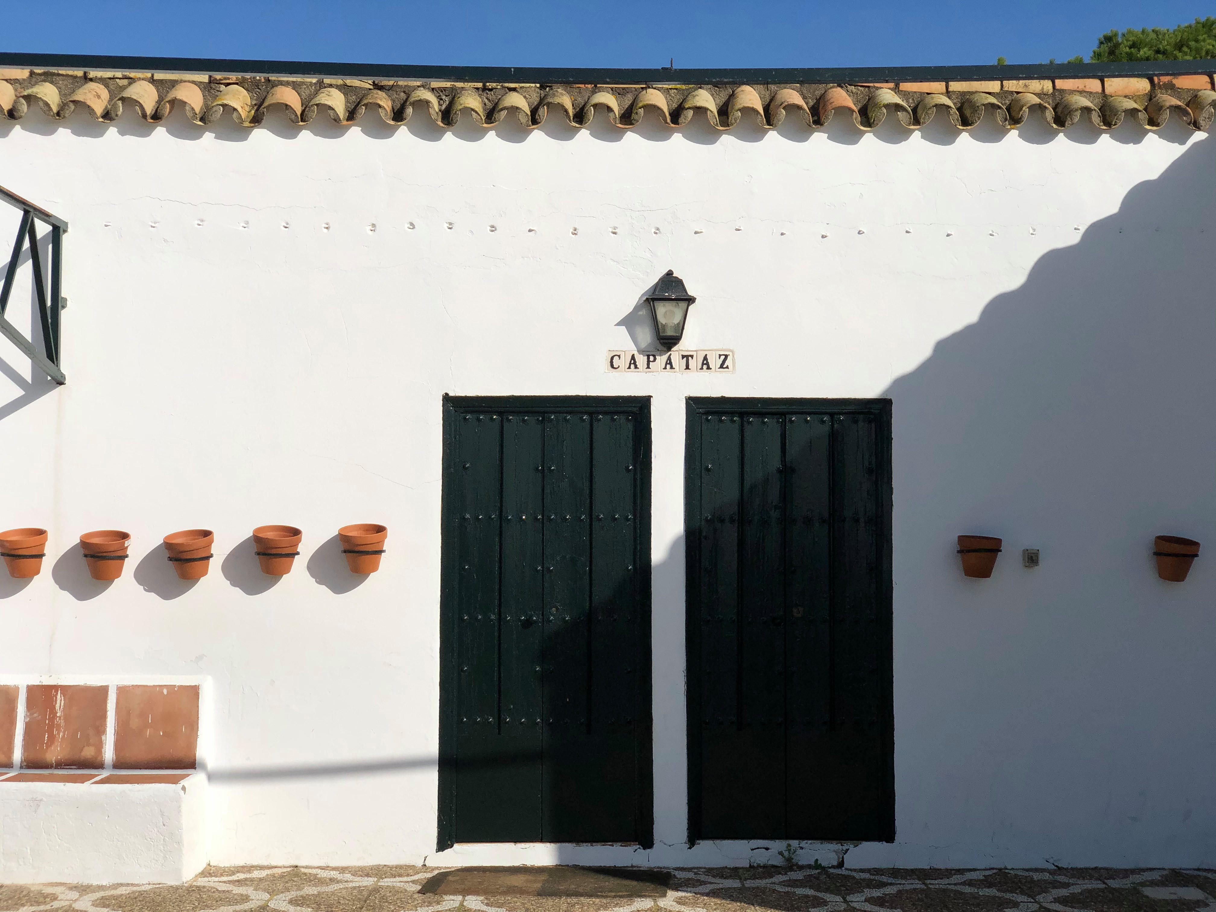 Doors and wall of a Capataz office in a traditional Sherry bodega in Jerez.